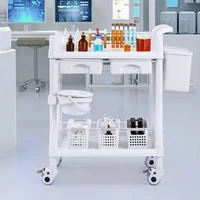 Cărucior-medical-mobil-cu-două-tăvi-două-sertare-și-trei-coșuri-pentru-deșeuri