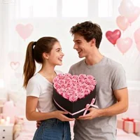 Trandafiri-roz-eterni-27-trandafiri-conservați-într-o-cutie-în-formă-de-inimă-roz